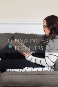 the blended mama journaling on a couch